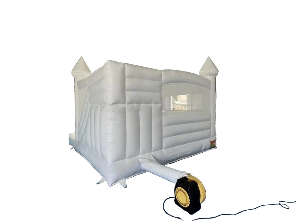 A white inflatable bouncy castle with a slide and a ball pit area, designed for children's events and parties.