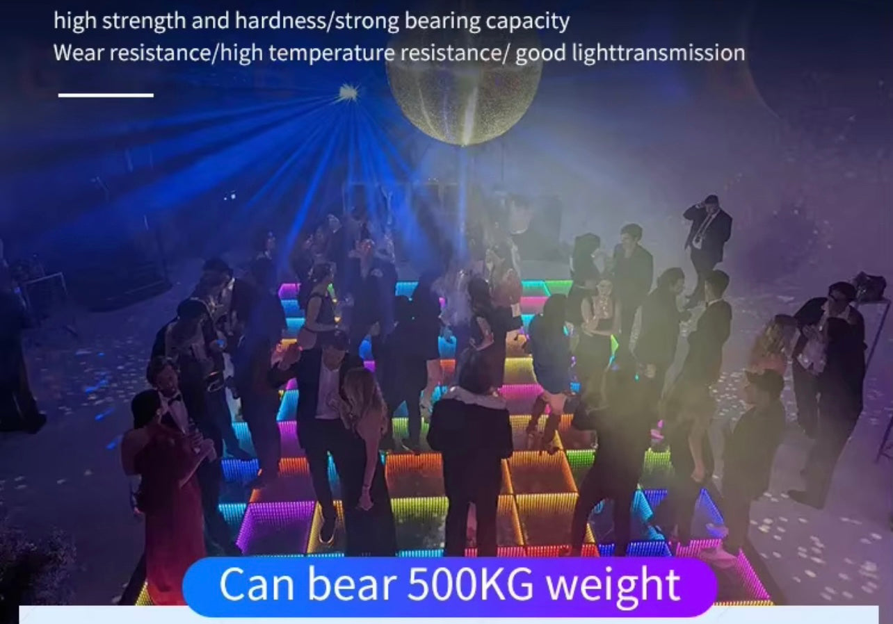 An LED RGB dance floor composed of multiple panels with vibrant blue and purple lighting, designed for use in events such as weddings and parties.