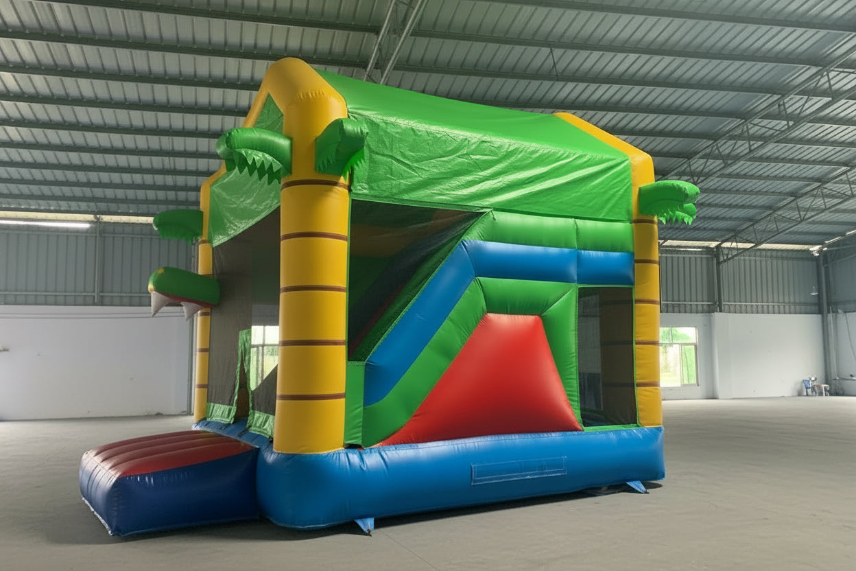 Colorful inflatable reptile bounce house in a warehouse setting