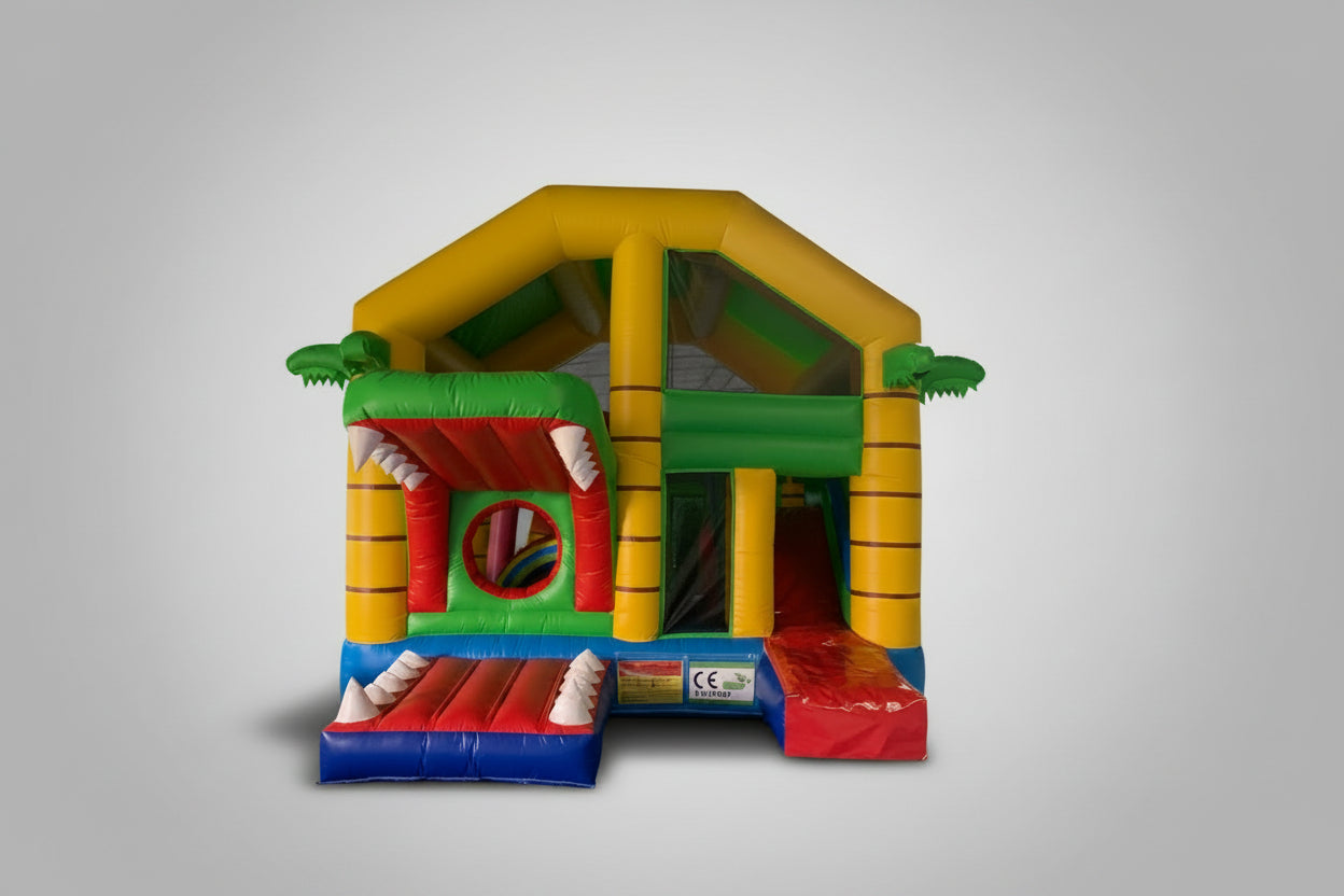 Colourful inflatable bounce house, reptile themed in an indoor setting