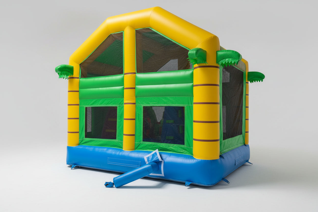 Colorful reptile inflatable bounce house with green, yellow, and blue colors on a white background