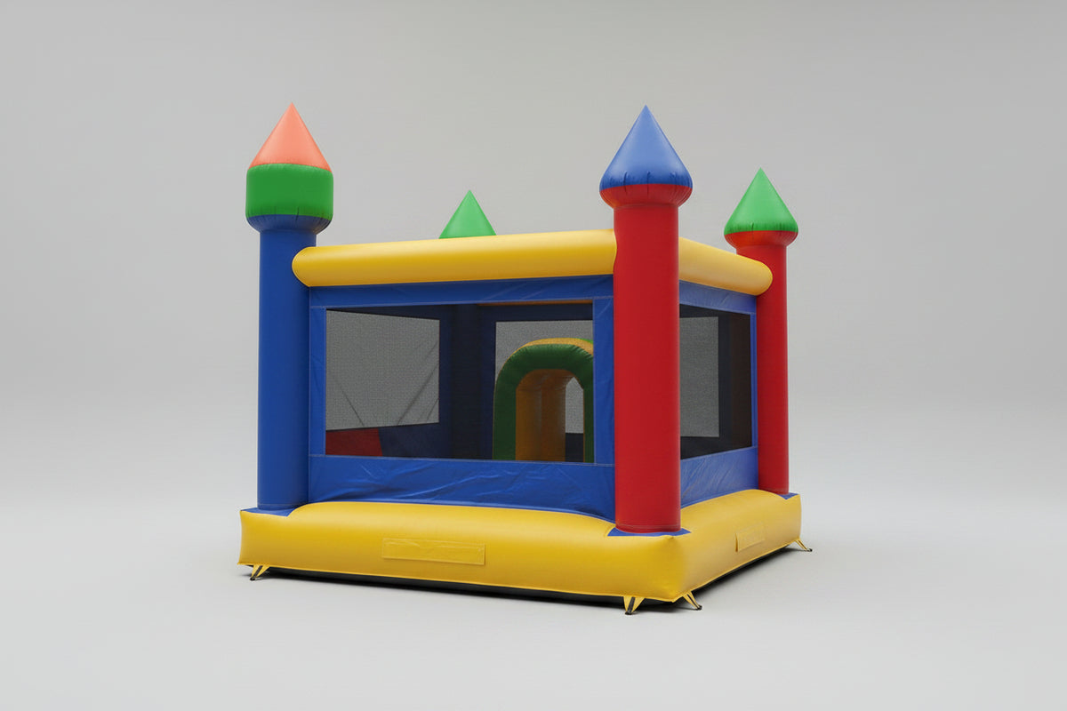 Colorful inflatable bounce house with towers on a white background