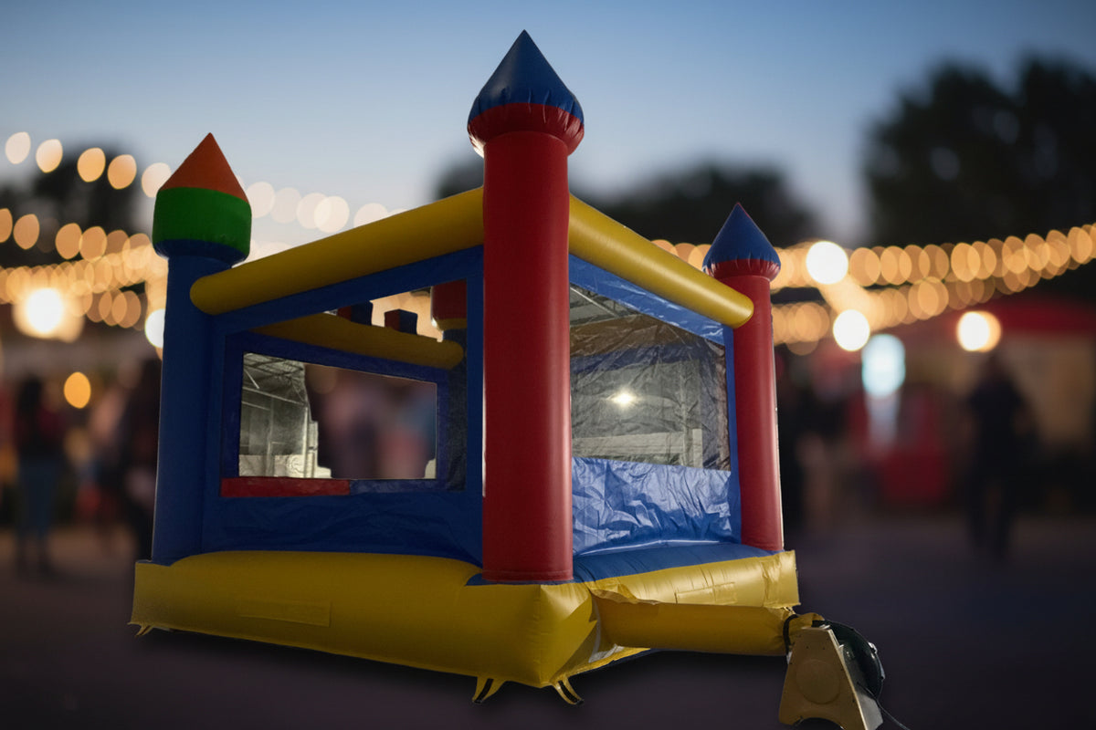 Colorful inflatable bounce house in a fun fair setting