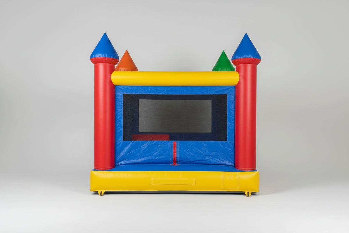 Colorful inflatable bounce house with castle design on a white background