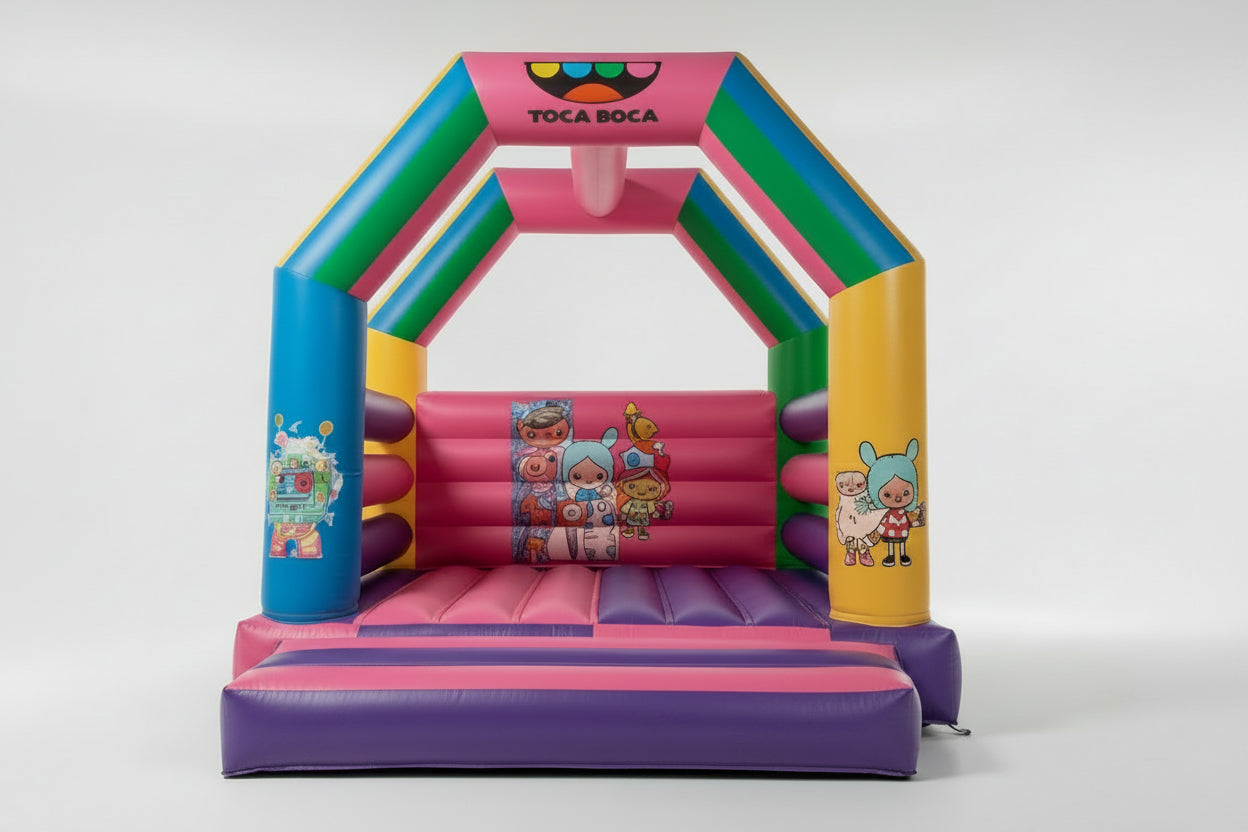Colorful inflatable bounce house with Toca Boca branding on a white background