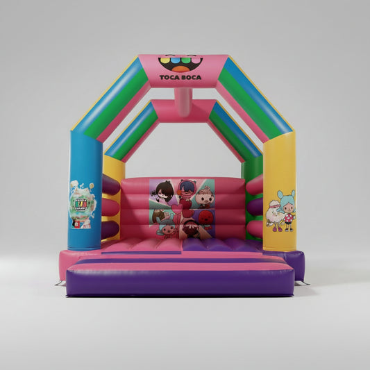 Colorful inflatable bouncy castle with 'Toca Boca' branding on a white background
