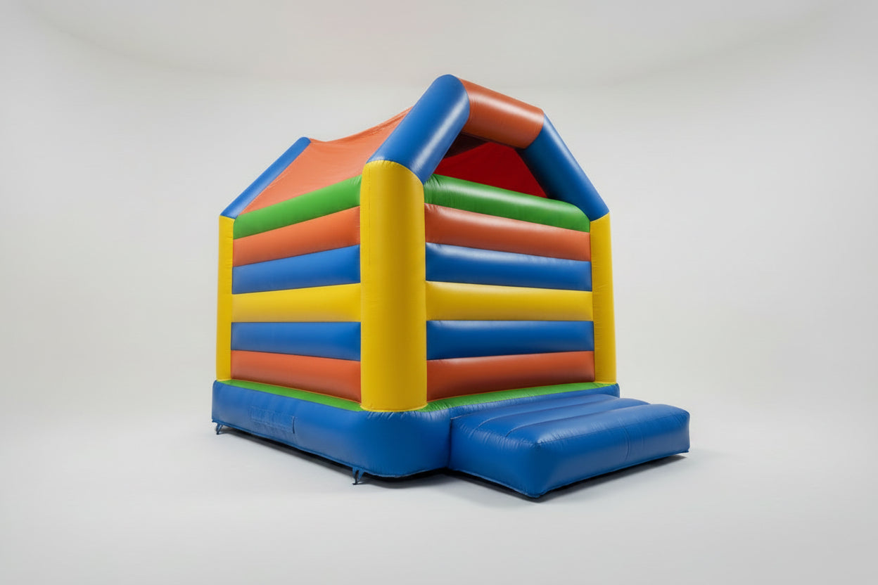 Colorful inflatable bounce house on a white background