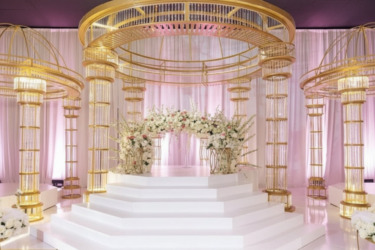  3 sets of all gold mandaps in an elegant wedding setting with floral arrangement