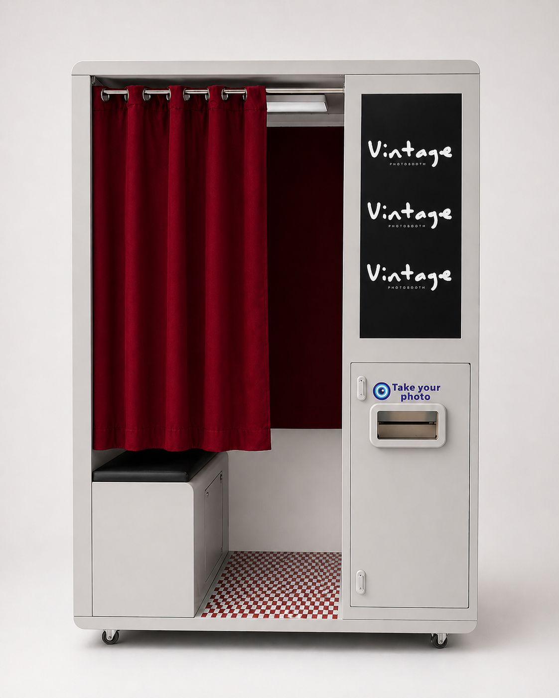 Vintage enclosed photo booth with red curtain and 'Take your photo' machine on a white background
