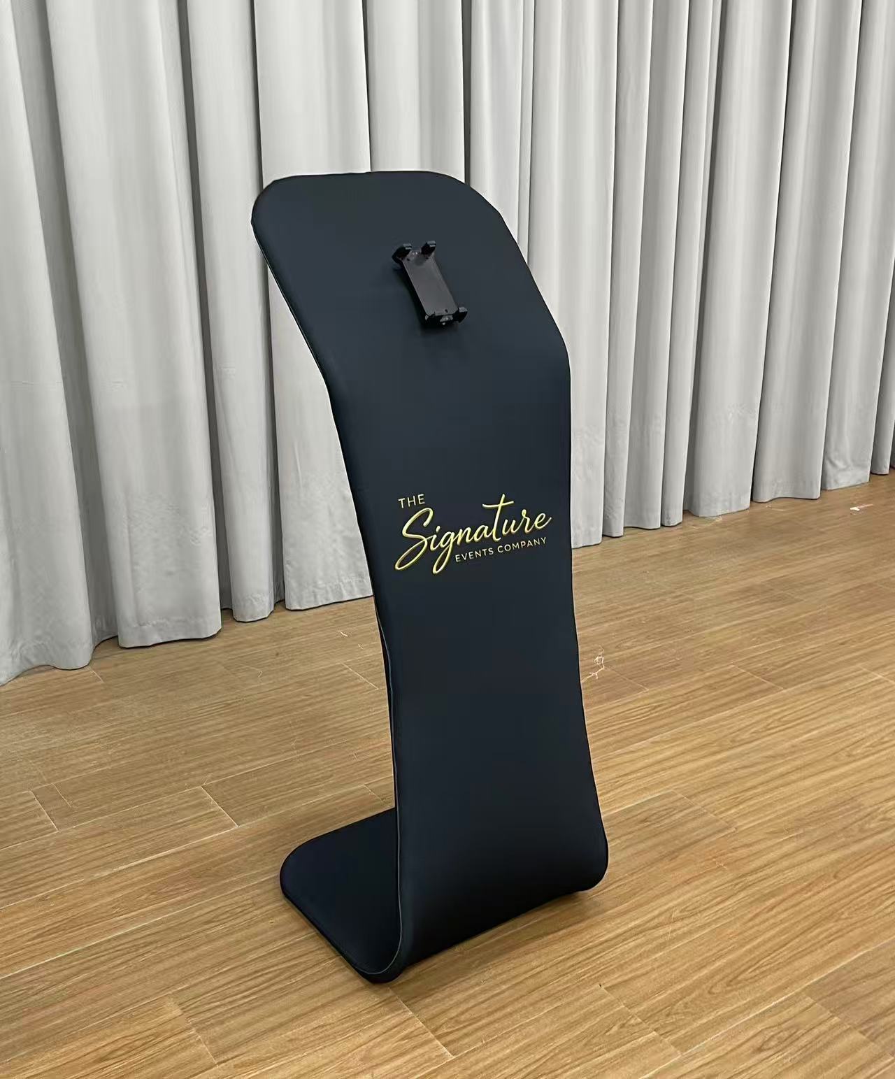A black customisable tablet sharing station 