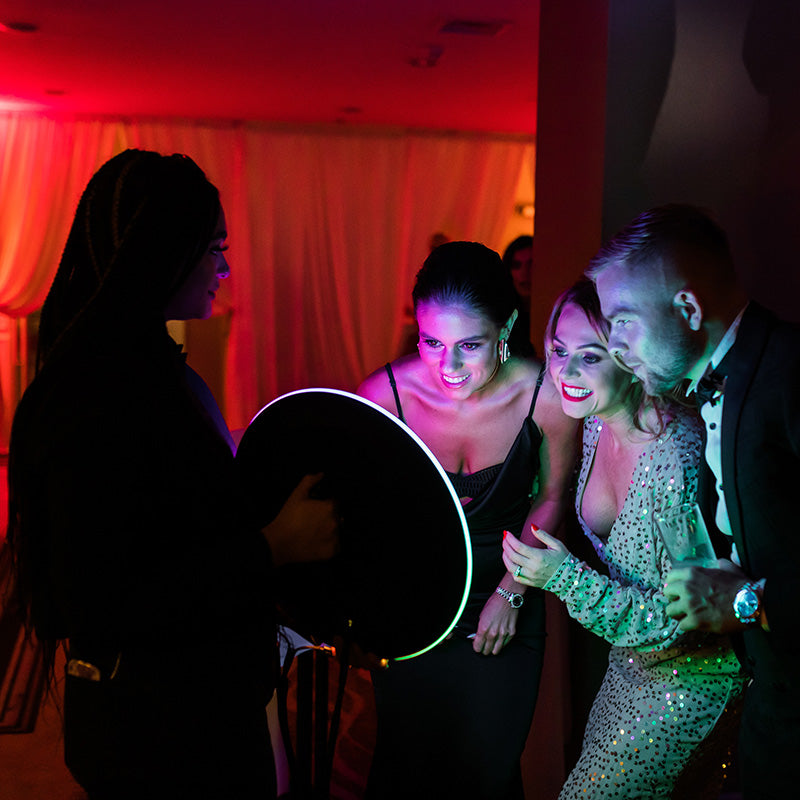 Person holding a Roamer IPad Photobooth LED Ring Light 