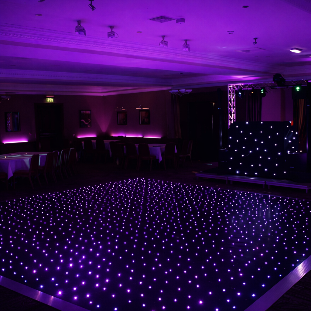 Black Starlit LED Dance Floor in a dimly lit room with purple lighting