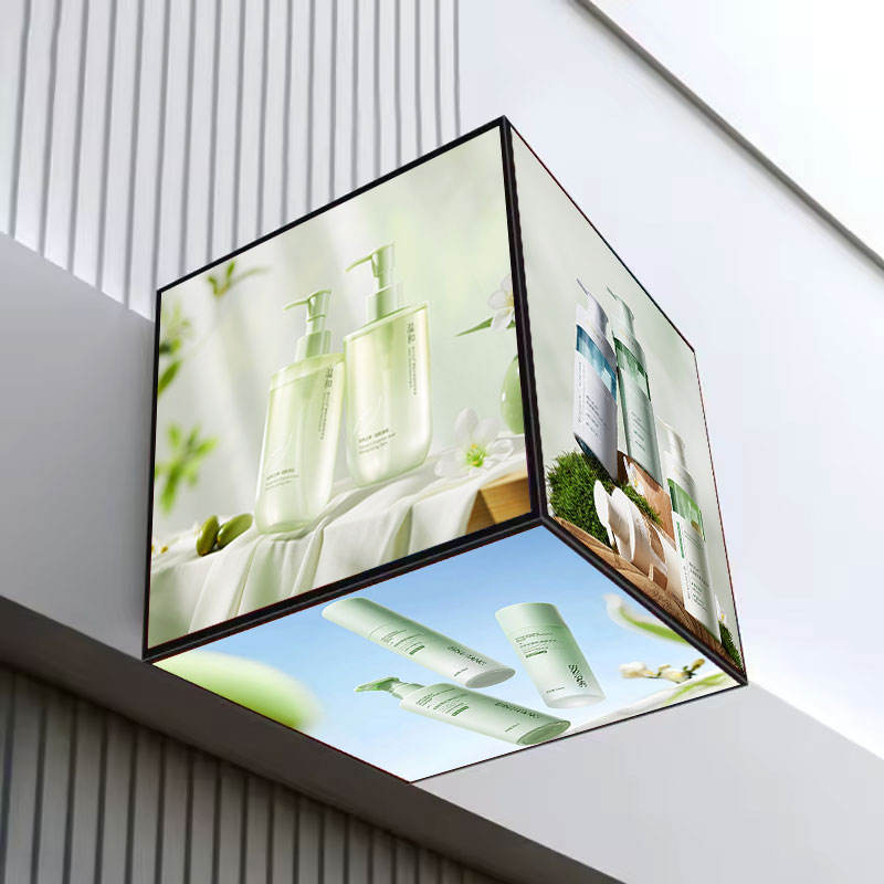 Modern indoor advertisement on a 5 sided LED digital cube showing product images.