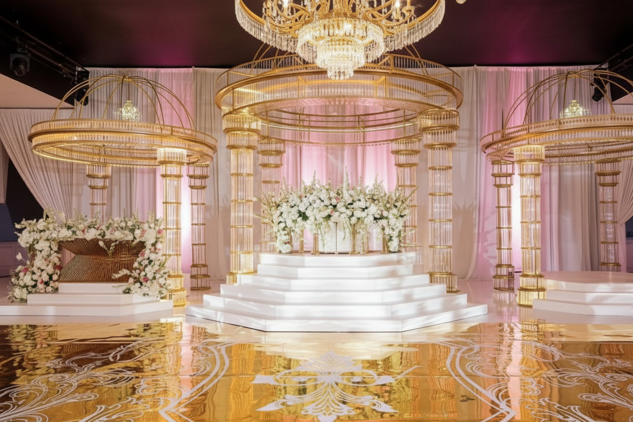3 sets of all gold mandaps in an elegant wedding setting with floral arrangement