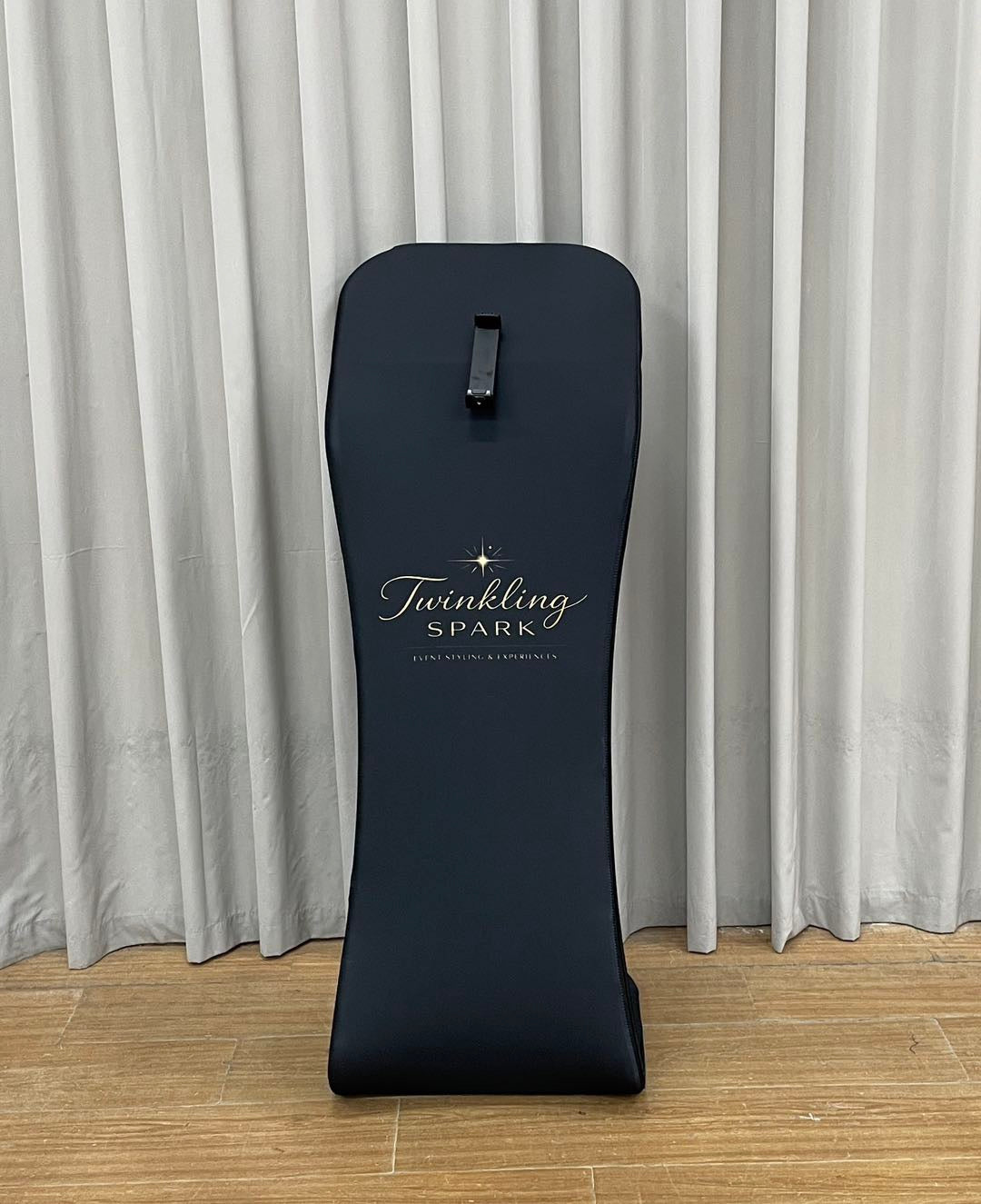 A black customisable tablet sharing station 