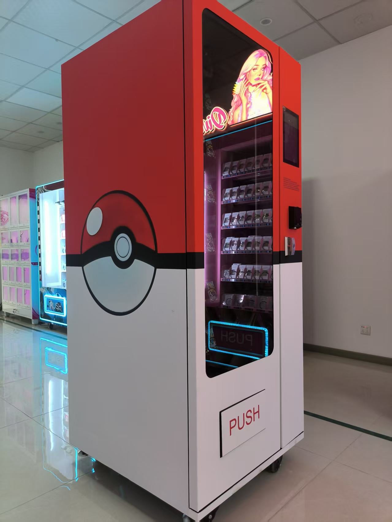Red and White Vending machine with a Poké Ball design in an indoor setting