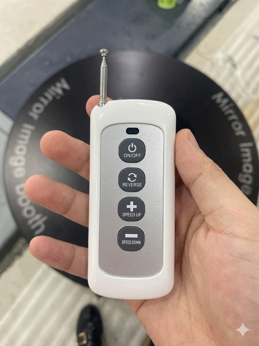 Hand holding a remote control with buttons on a blurred background