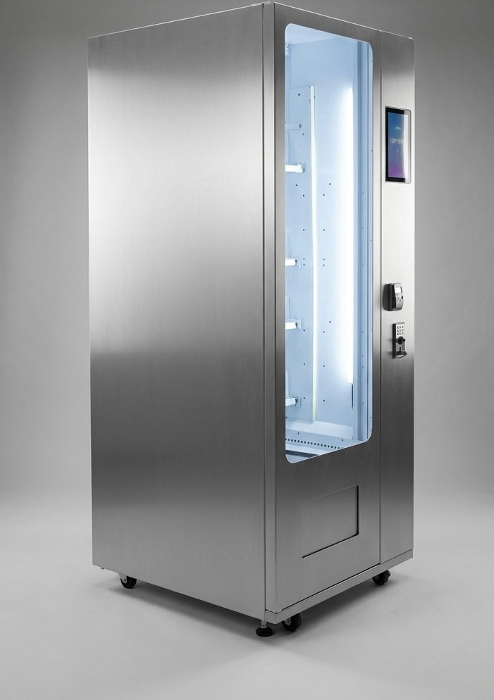Stainless steel vending machine on a gray background