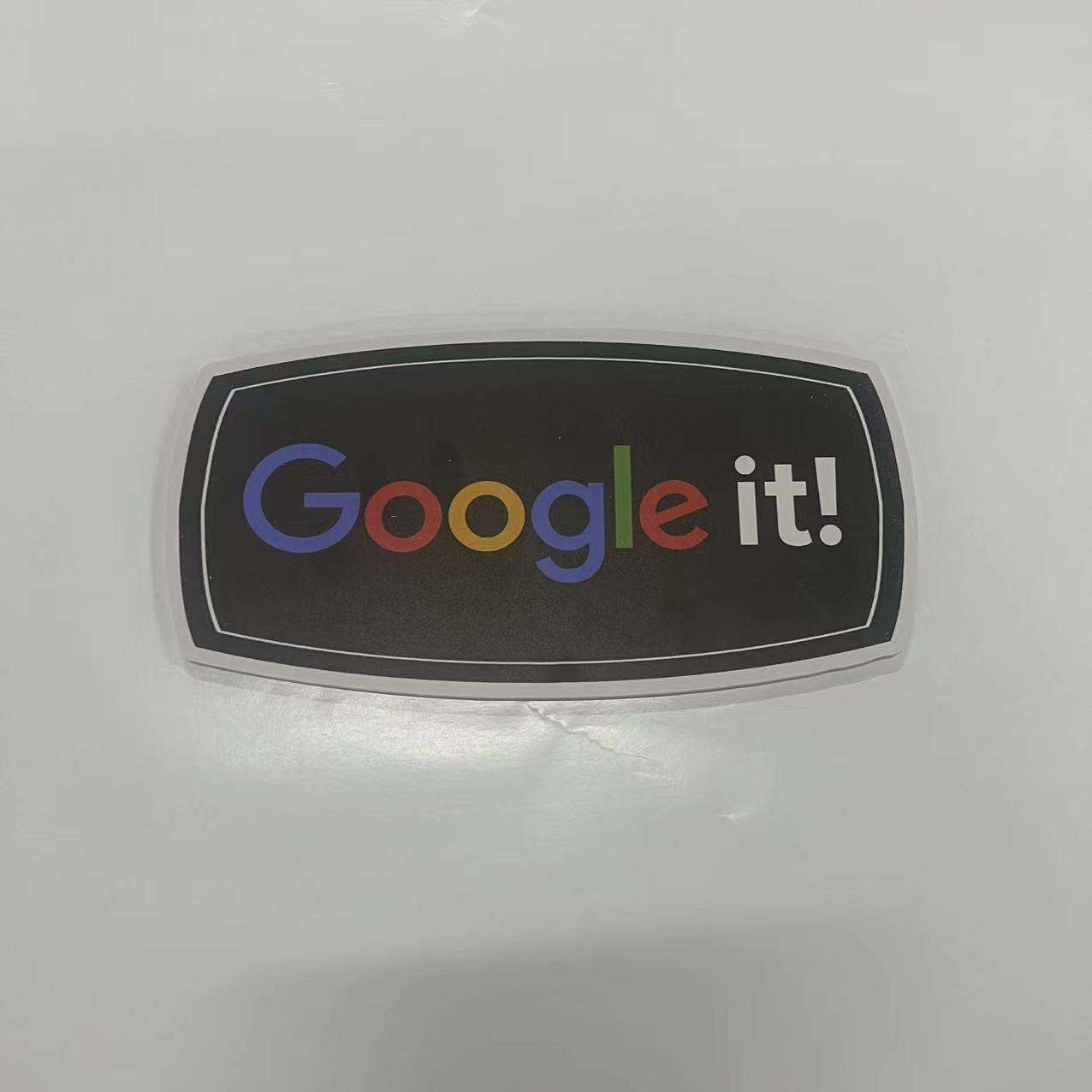 Photoobooth prop with 'Google it!' text on a white background