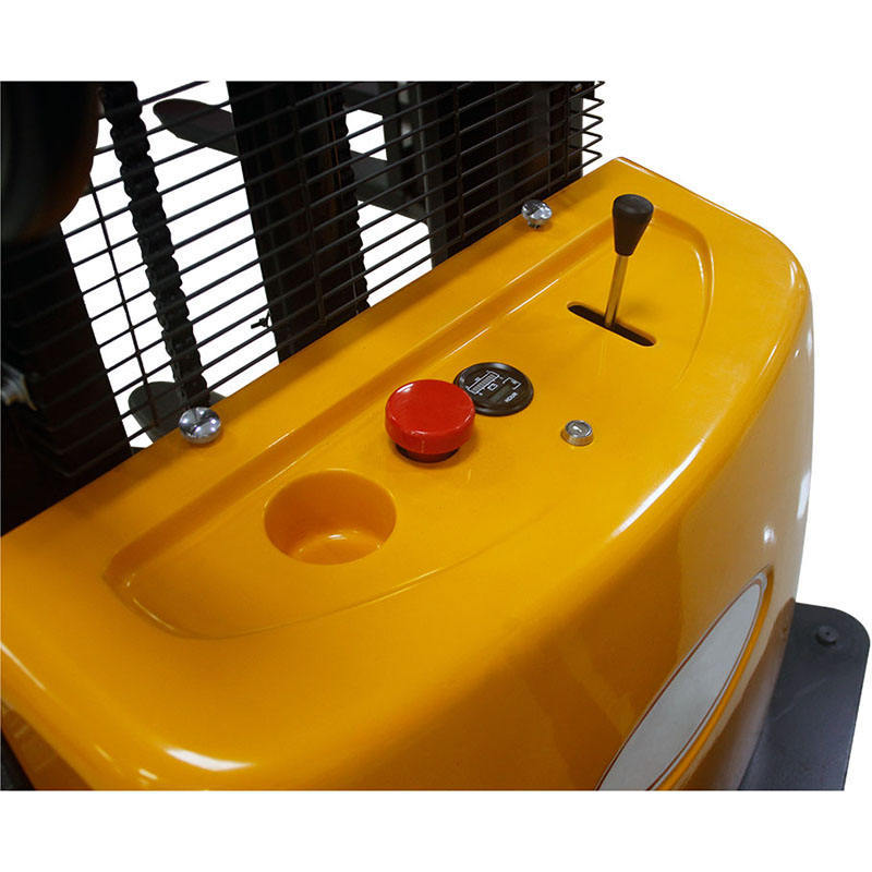 Close-up of a yellow forklift machine with control elements on a white background
