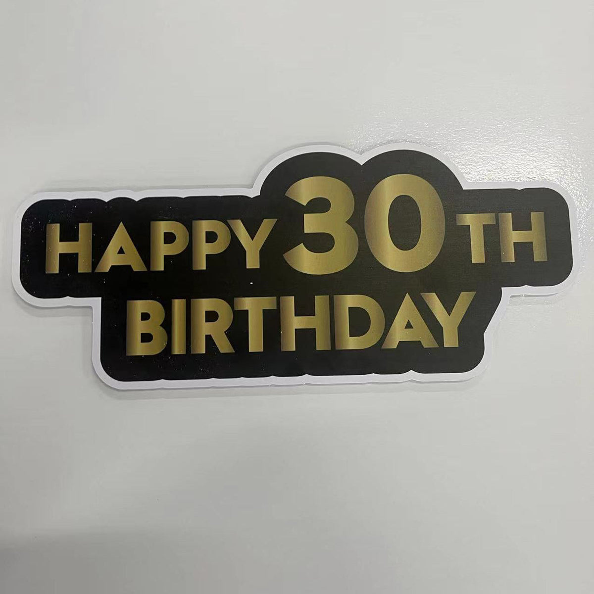Photobooth prop with 'Happy 30th Birthday' text on a white background