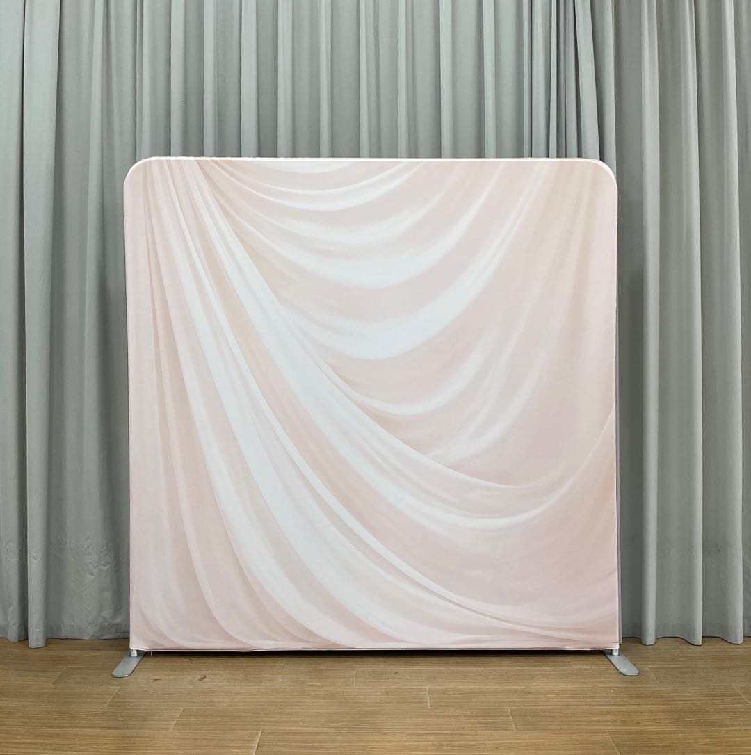 A double-sided pillowcase backdrop displayed on a sturdy frame, suitable for events and photography.