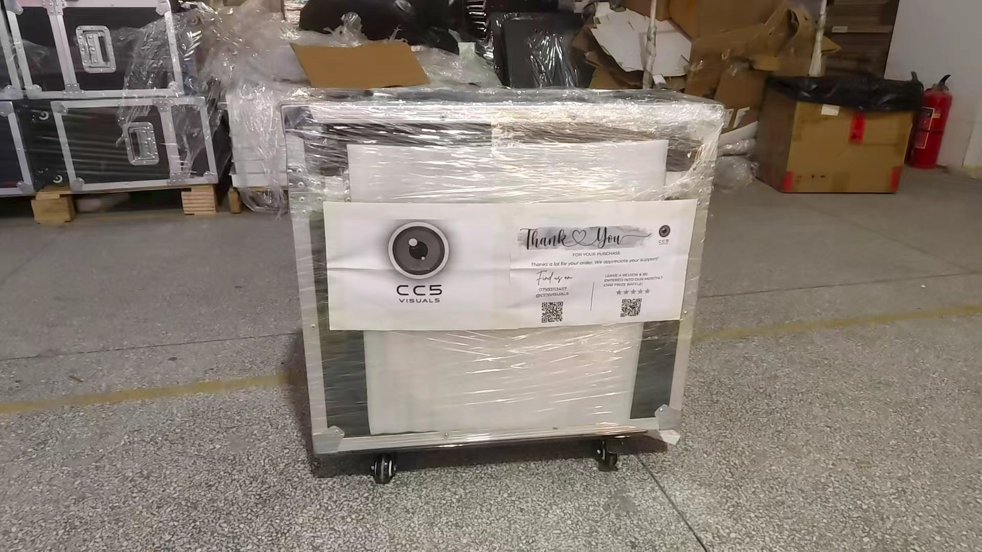 Commercial travel case on a concrete floor with CC5 Visuals logo