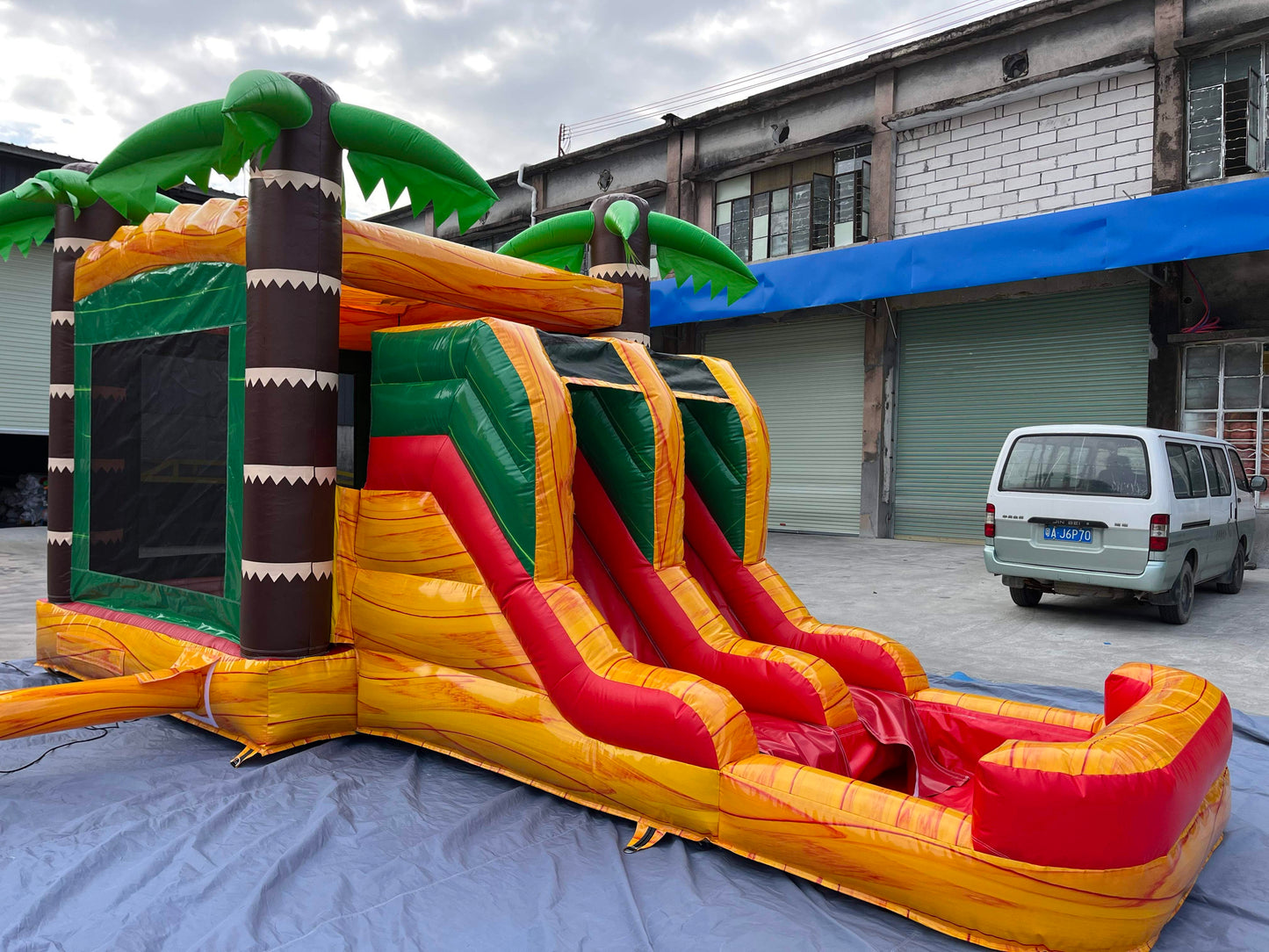 Tropical Bouncy Castle With 2 Slides & Ball Pit