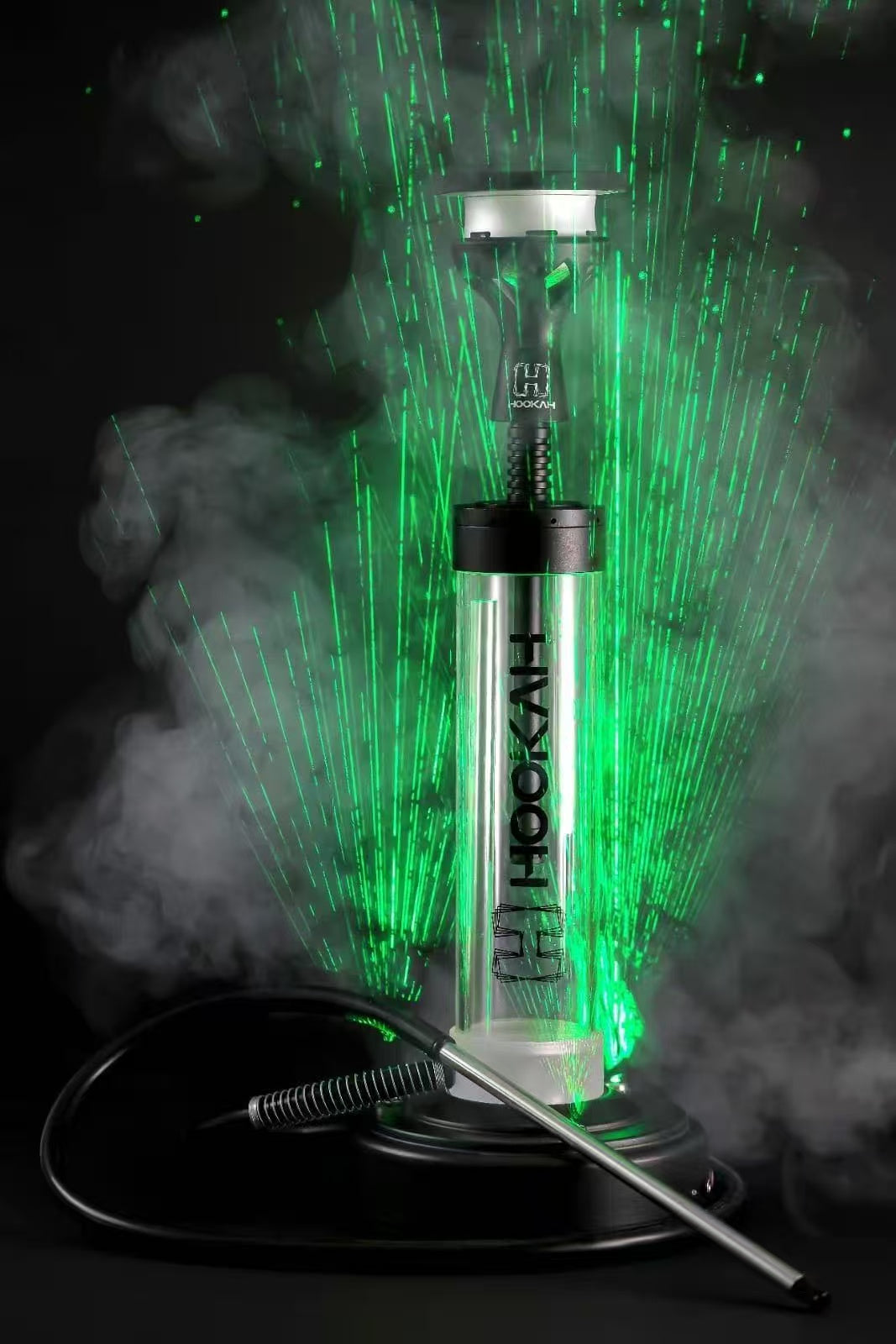 Clear hookah pipe with green laser lights and smoke on a dark background