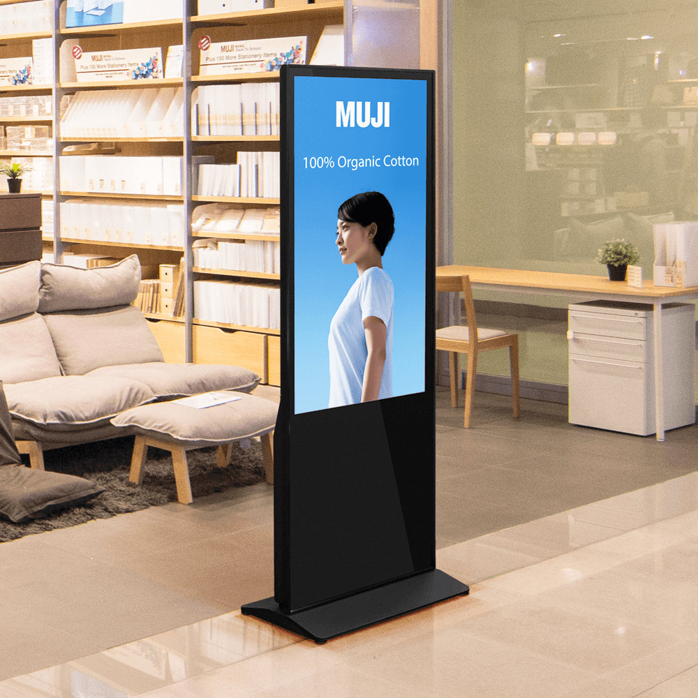 43” LED Touchscreen Indoor Digital Kiosk Floor Standing with MUJI branding in a store setting