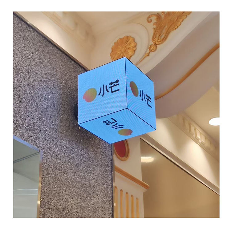 4 sided display LED cube with brand logo fixed on an outdoor wall. 