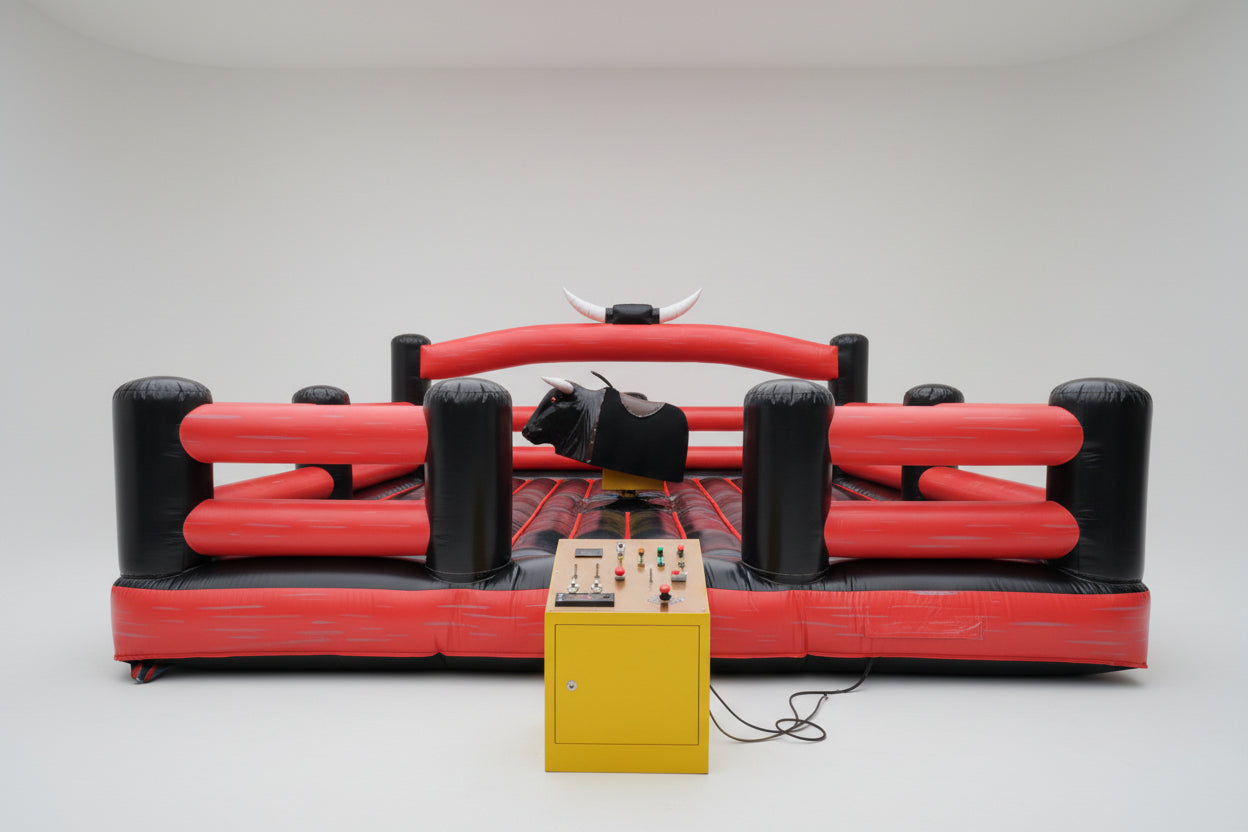 Red and black Inflatable bull ride with control panel in front and square shaped inflatable cushion surrounding it