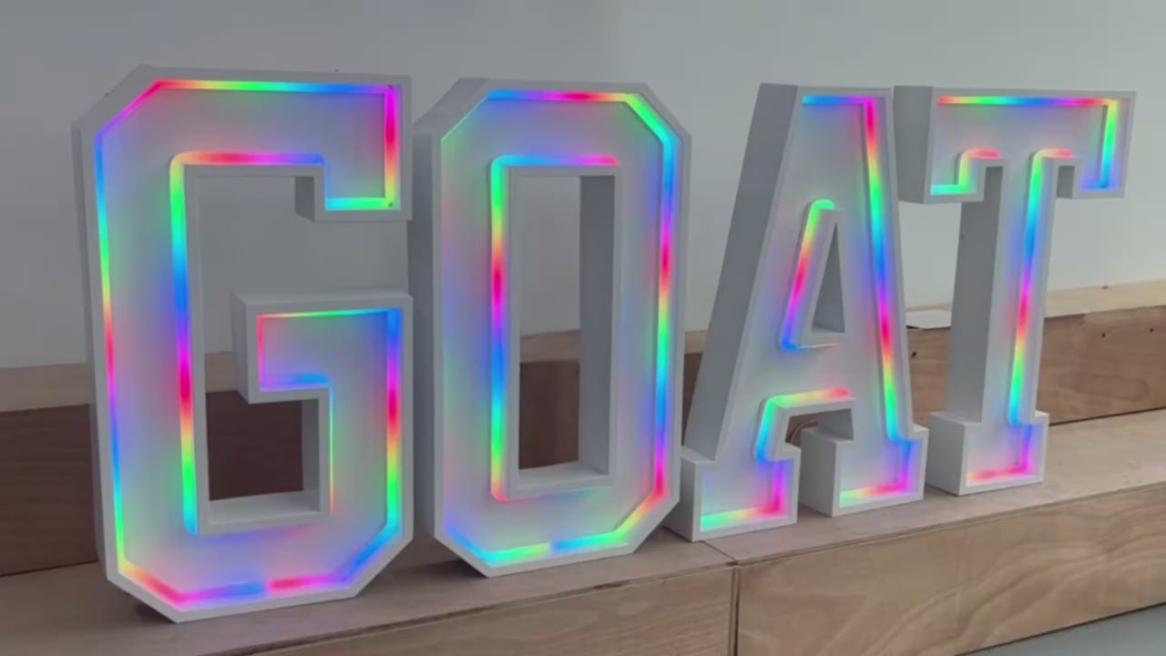 4FT multicoloured neon LED sign spelling 'GOAT'
