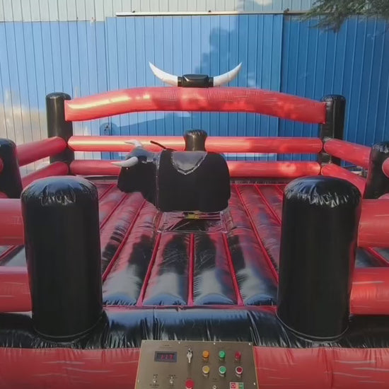 Black and red inflatable bull ride machine