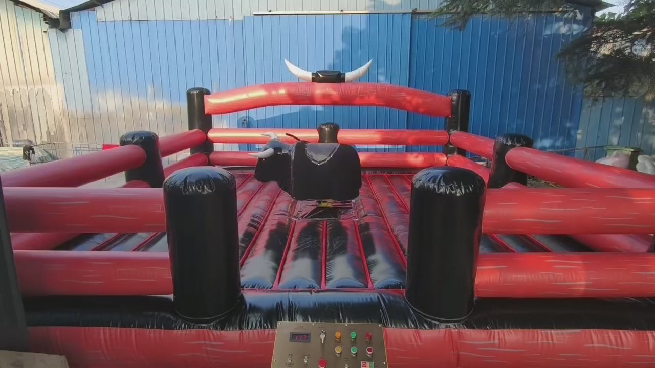 Black and red inflatable bull ride machine